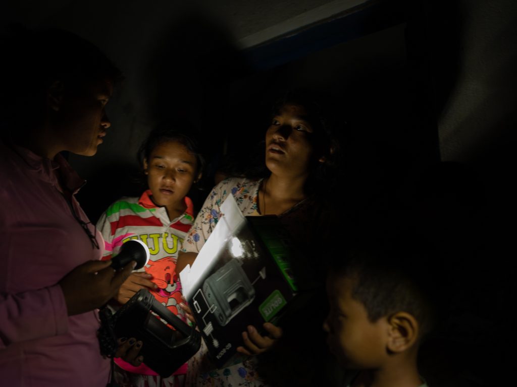 Solar kits distribution at flash flood affected Nuwakot's village, Betrawati
